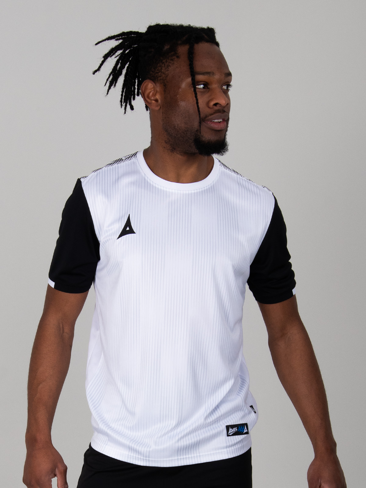 a white and black football shirt with graphic print