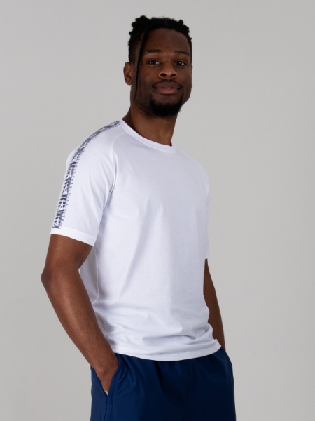 Model is wearing a white cotton t-shirt with Navy Avec Logo taping on sleeves