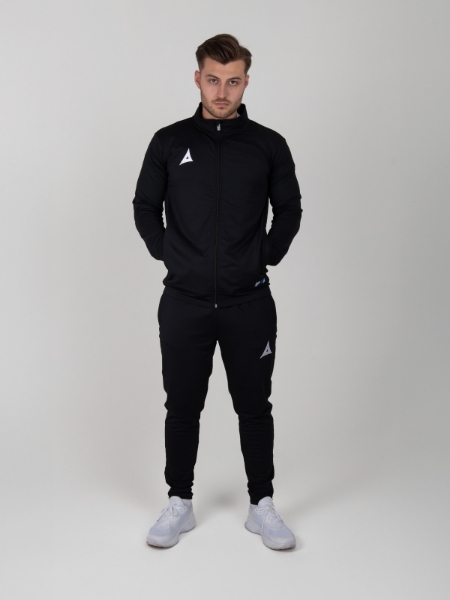 A man is wearing a full plain black tracksuit