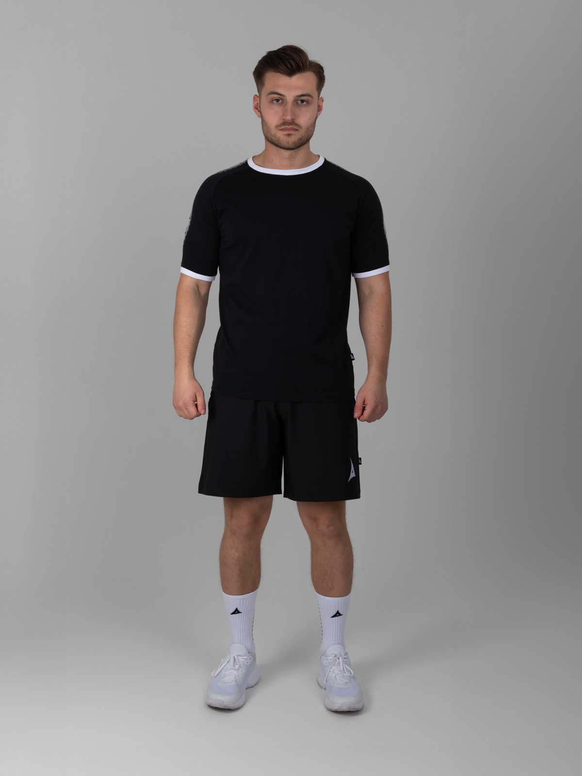 a black cotton t-shirt is great for casual wear, along with the focus tech shorts