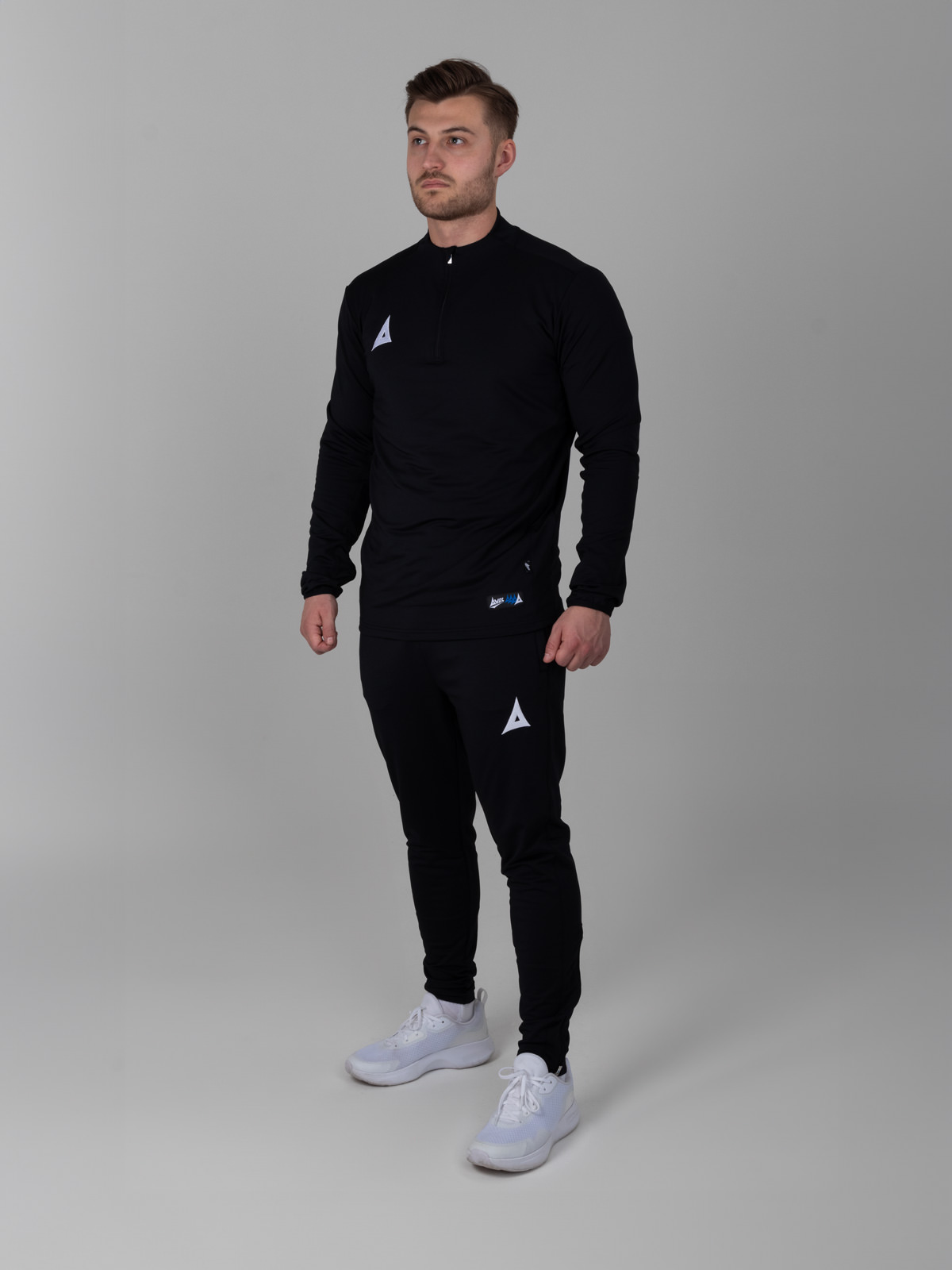 model is wearing a plain black tracksuit, which items are sold as seperates