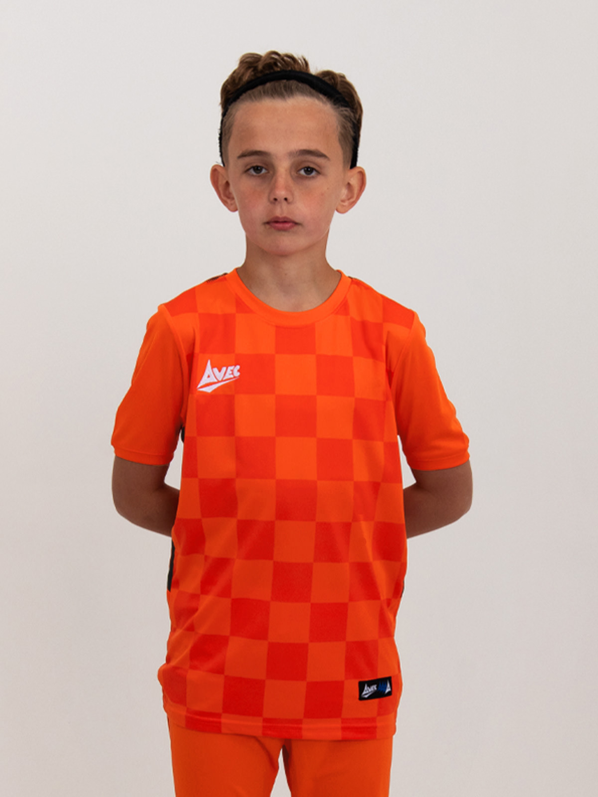 an orange children's football shirt