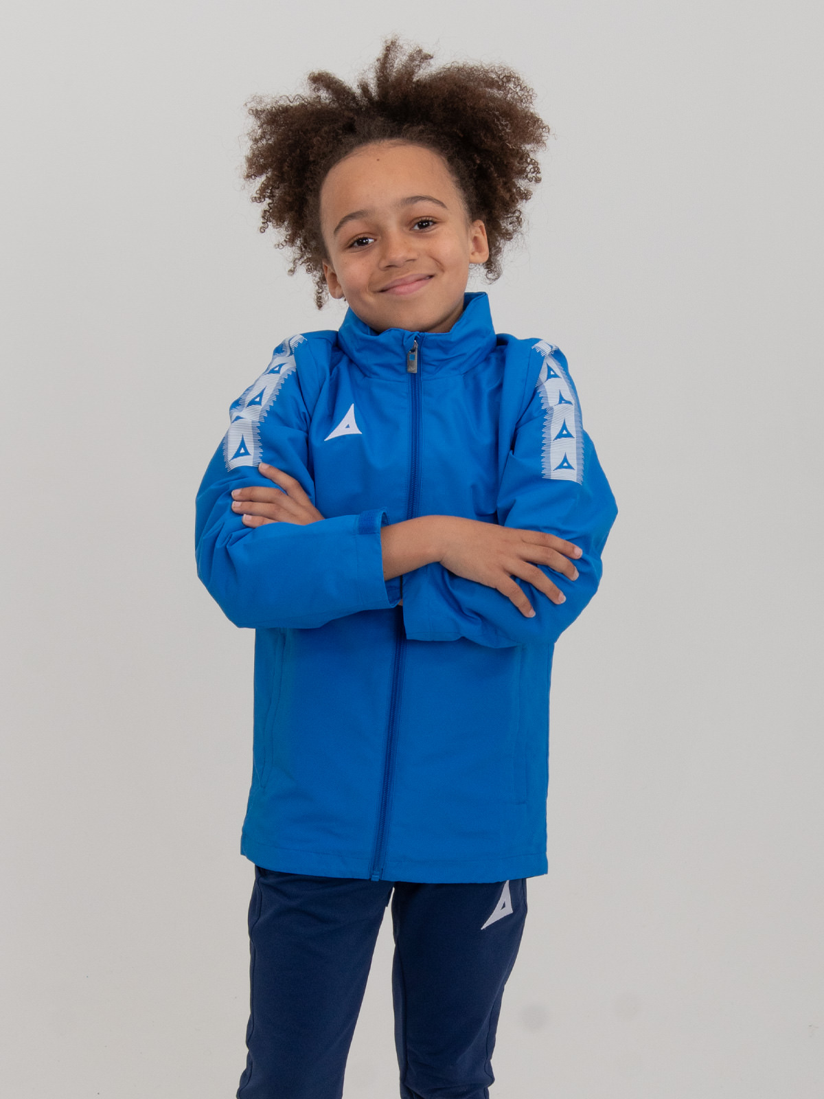 a kids rain jacket in royal blue made of premium quality