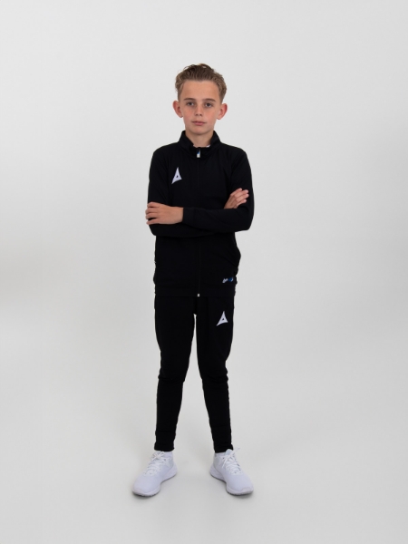 A kids tracksuit in black is being modelled by a child.