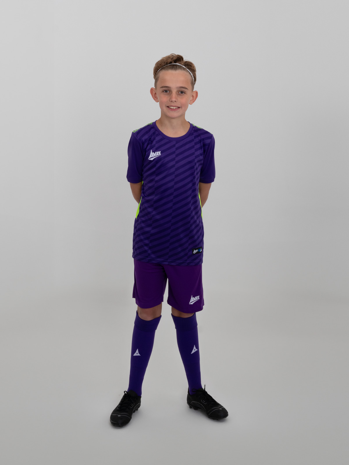 a full childs purple football kit