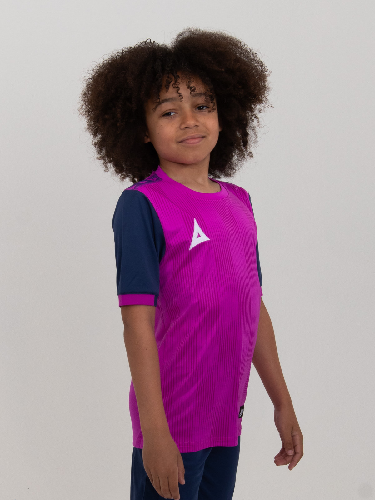 a unique colour colour combination of purple and navy make this football shirt a top choice for kids football teams