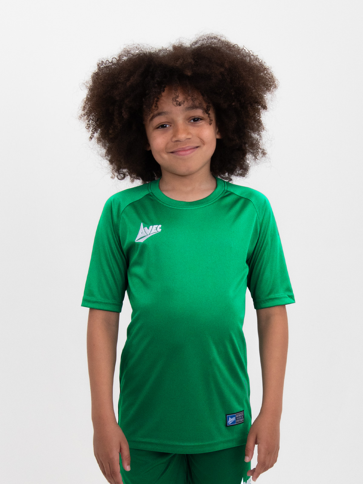 a plain green childrens football shirt