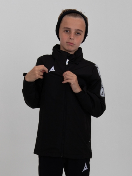 This rain repellent black rain jacket for children is modelled by a young child.