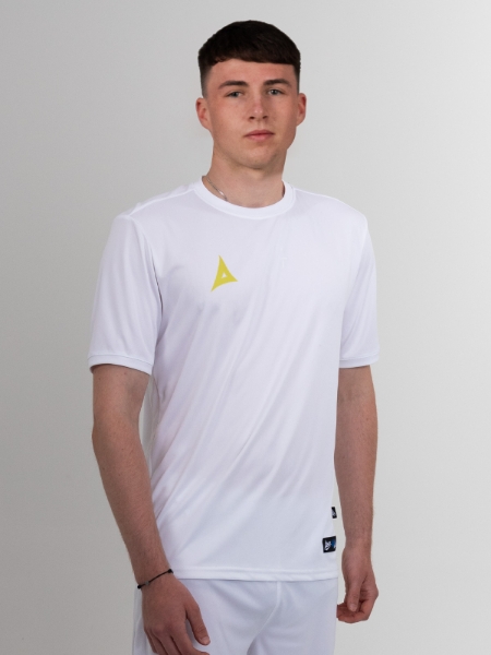 A man wearing an all white football shirt