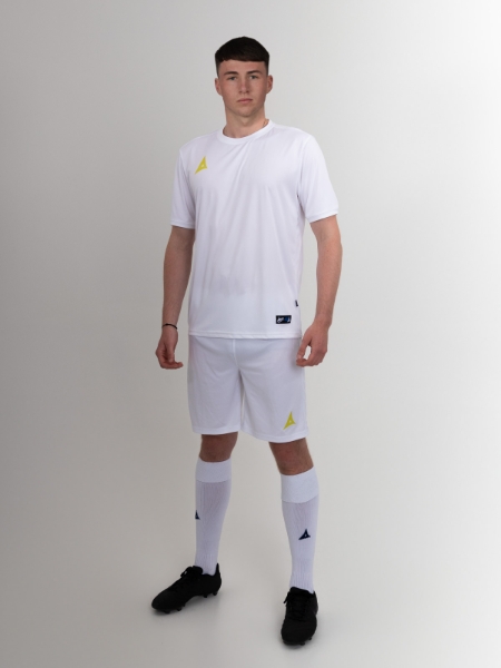 A man wearing an all white football kit