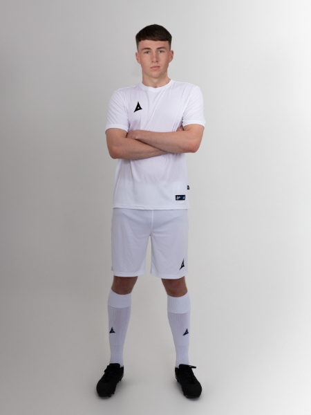 The person in the shoot is wearing a full white kit, but the shirt can also be worn with black shorts