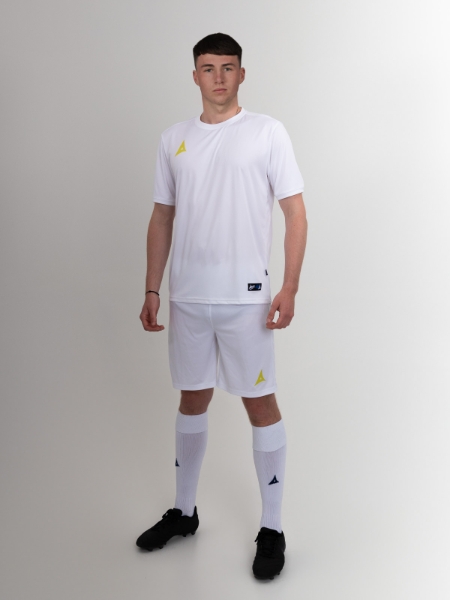 A complete white football kit with yellow logos is being worn by this man.