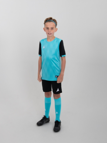 A child wearing a junior football kit which is light blue and black