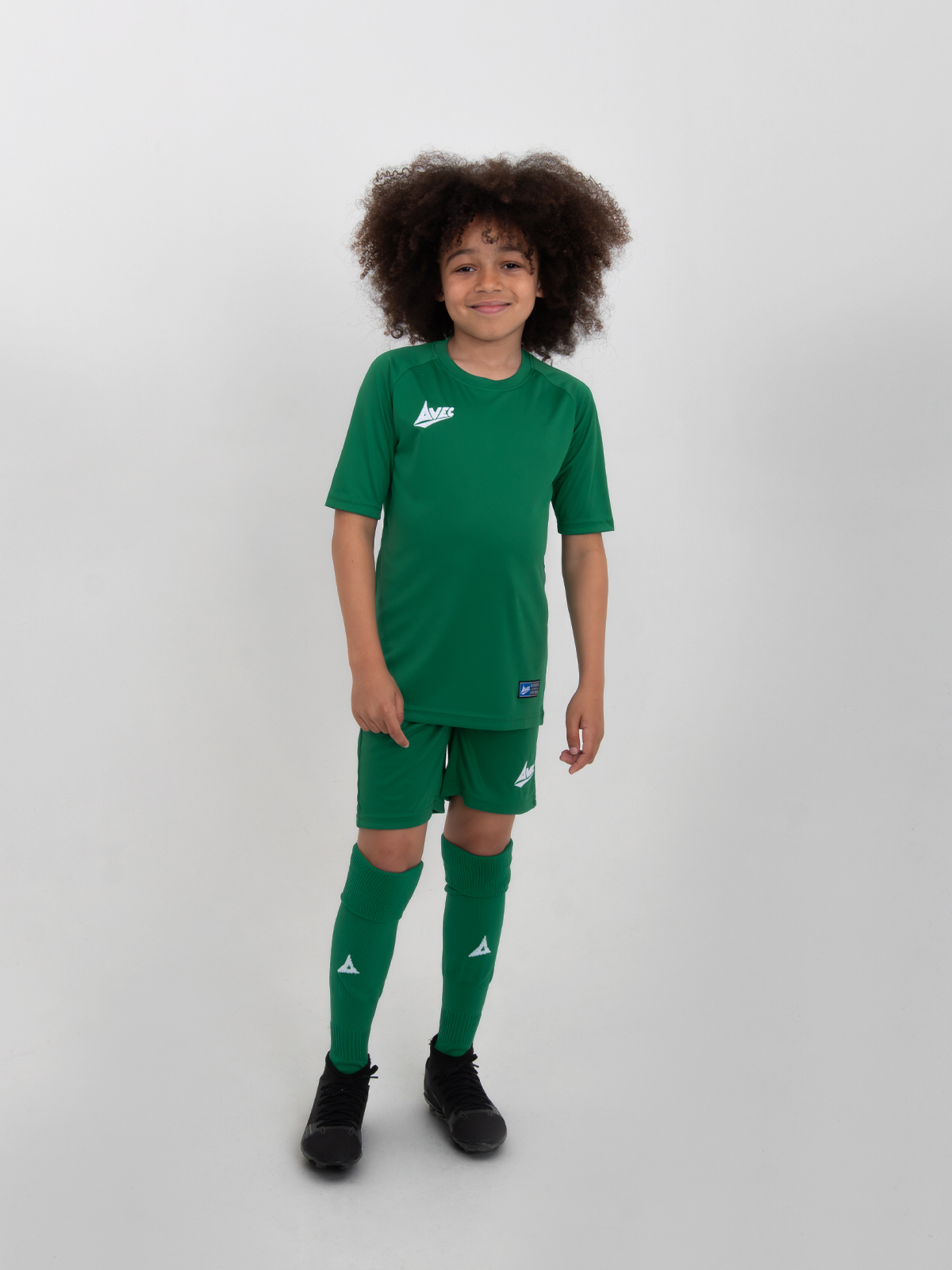 a kids full green football kit