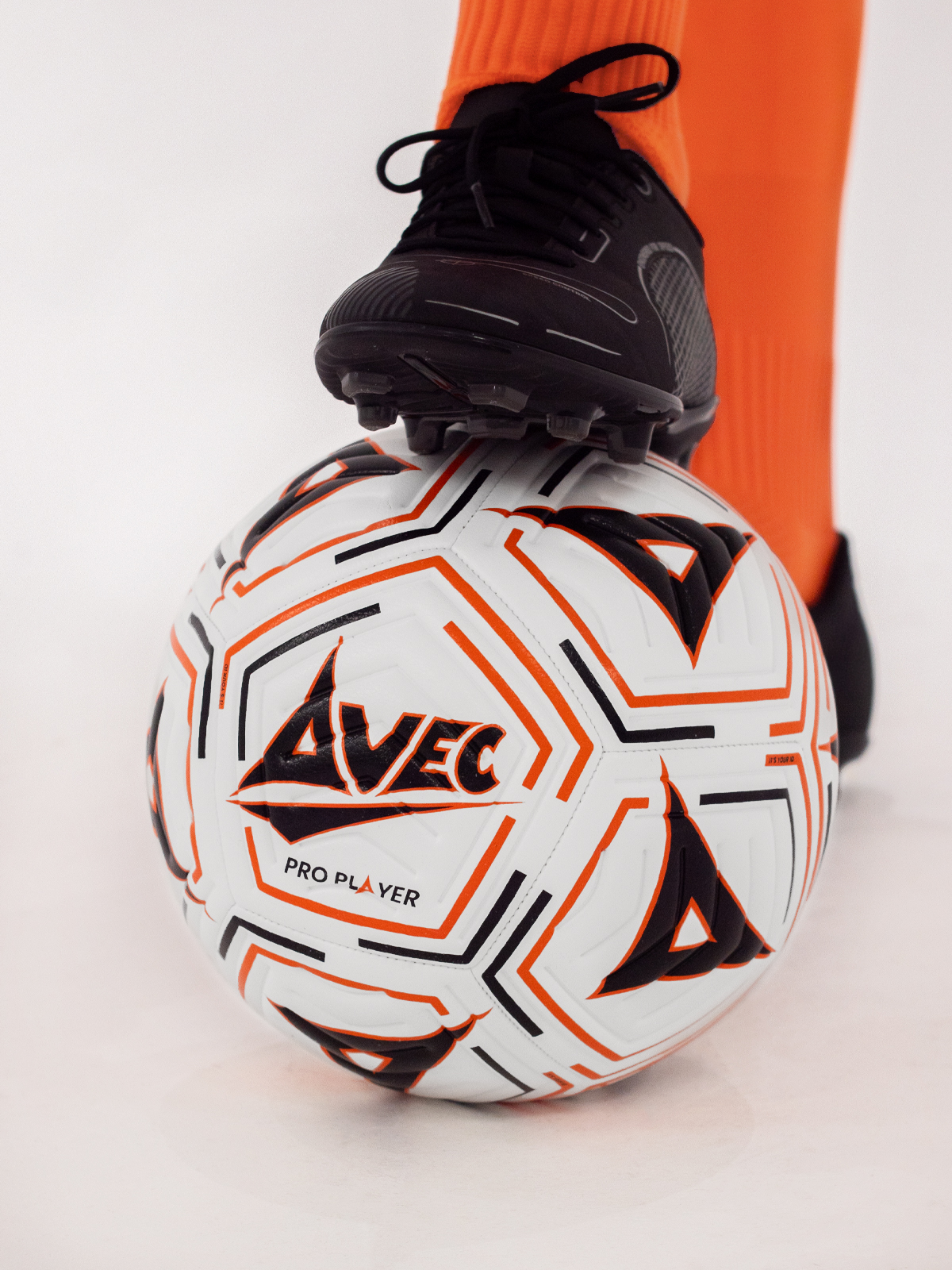 image of the avec football with black and orange graphic print design