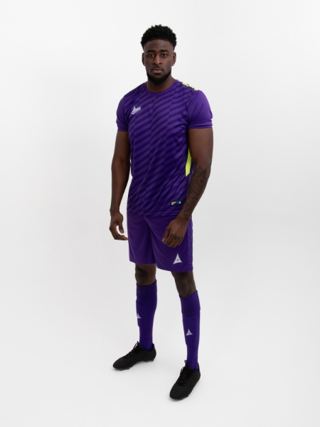 model is wearing a purple kit