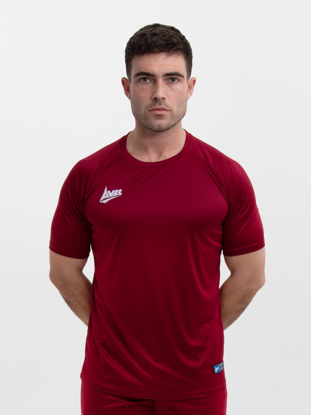 an adult claret football shirt is being worn by a man