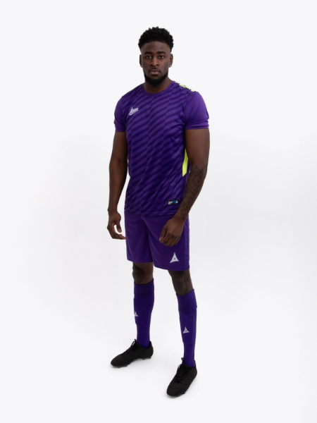 model is wearing a purple kit