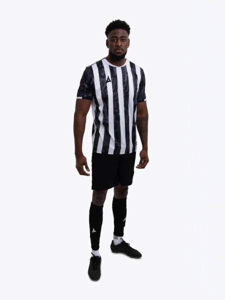 A Model wearing a Black and white stripe Sports football training t-shirt, like Newcastle United FC