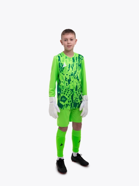 A young boy is wearing a full neon green goalkeeper football kit