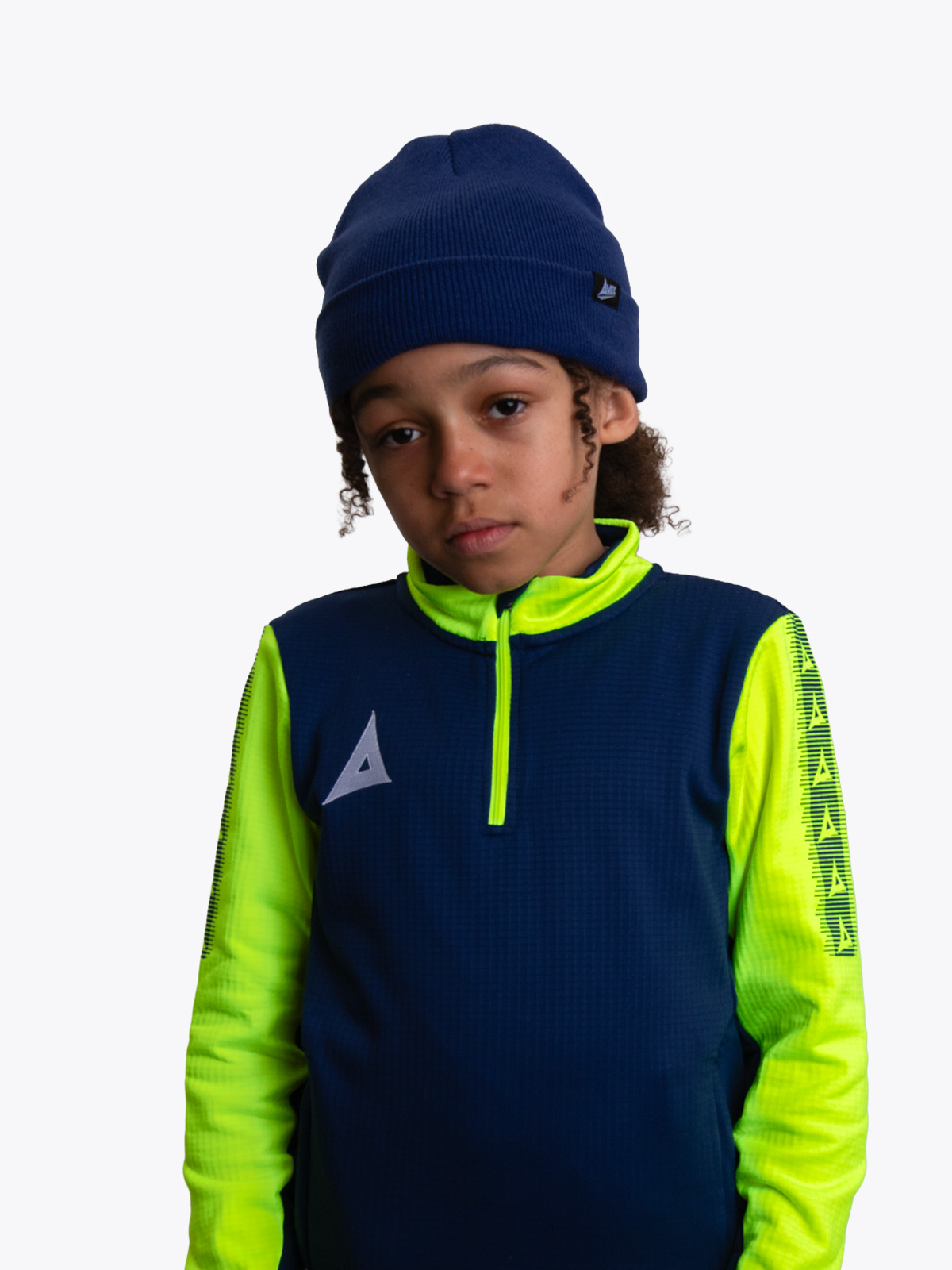 a boy wearing a navy turn up beanie and a navy and neon yellow overlay