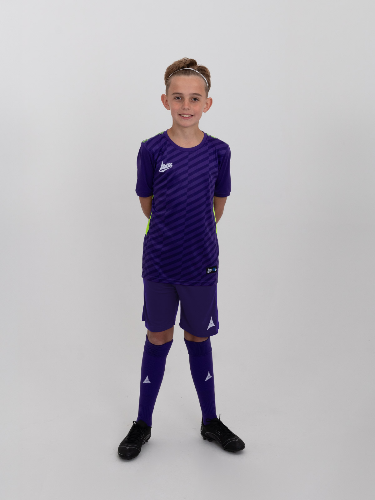 a full childs purple football kit
