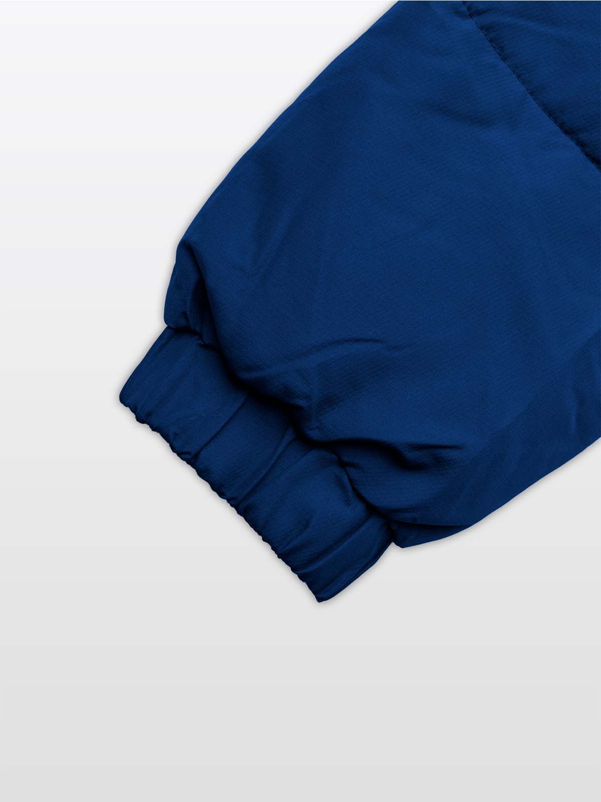close up of the sleeve cuff of the avec evolve pro padded jacket in navy