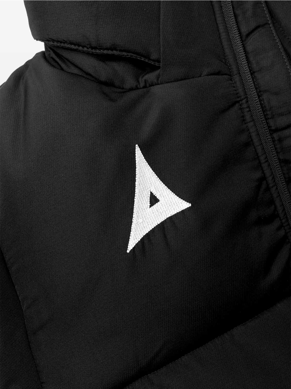 close up of the embroidery of the avec evolve pro padded jacket in black