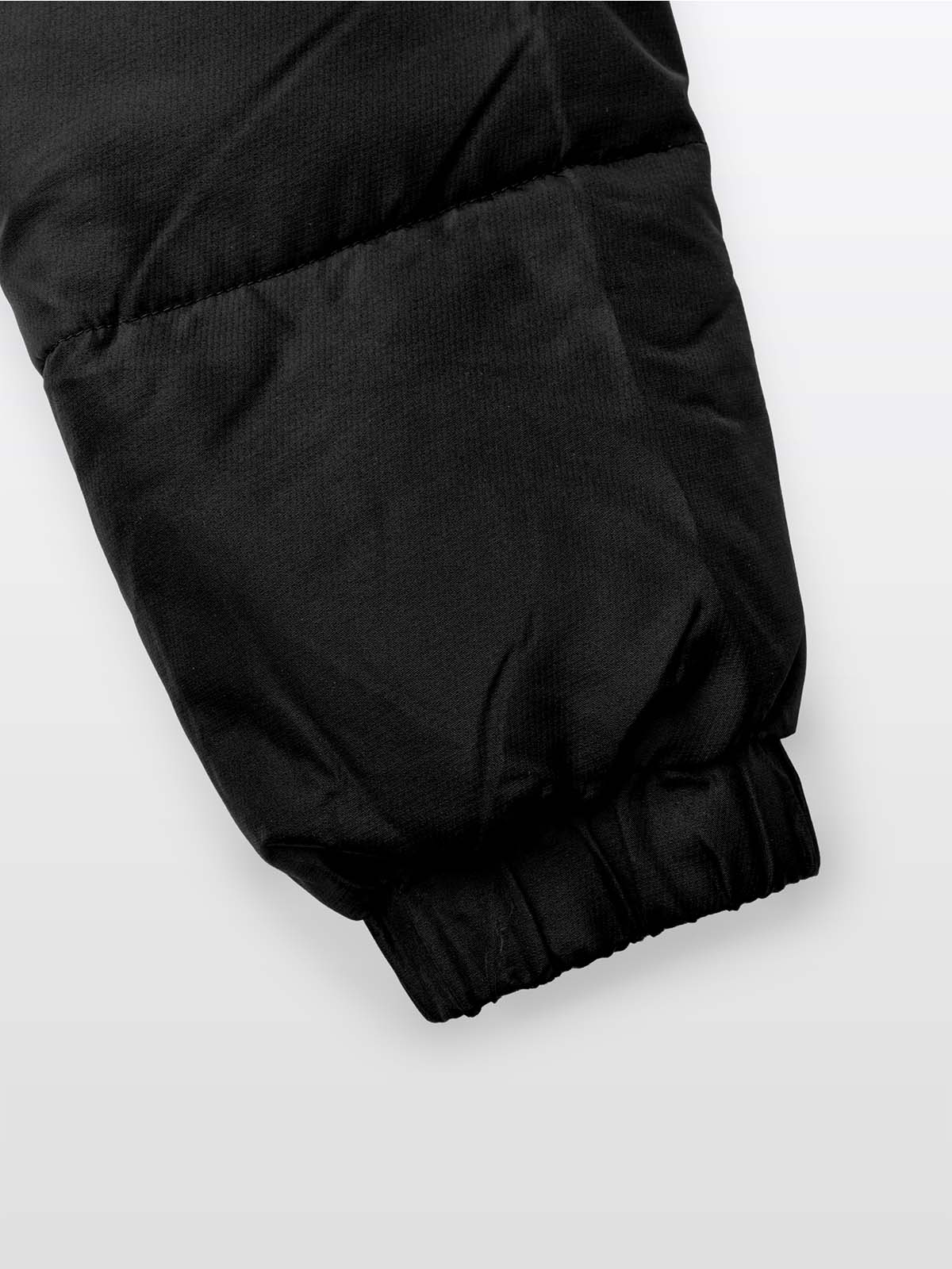 close up of the sleeve cuff of the avec evolve pro padded jacket in black