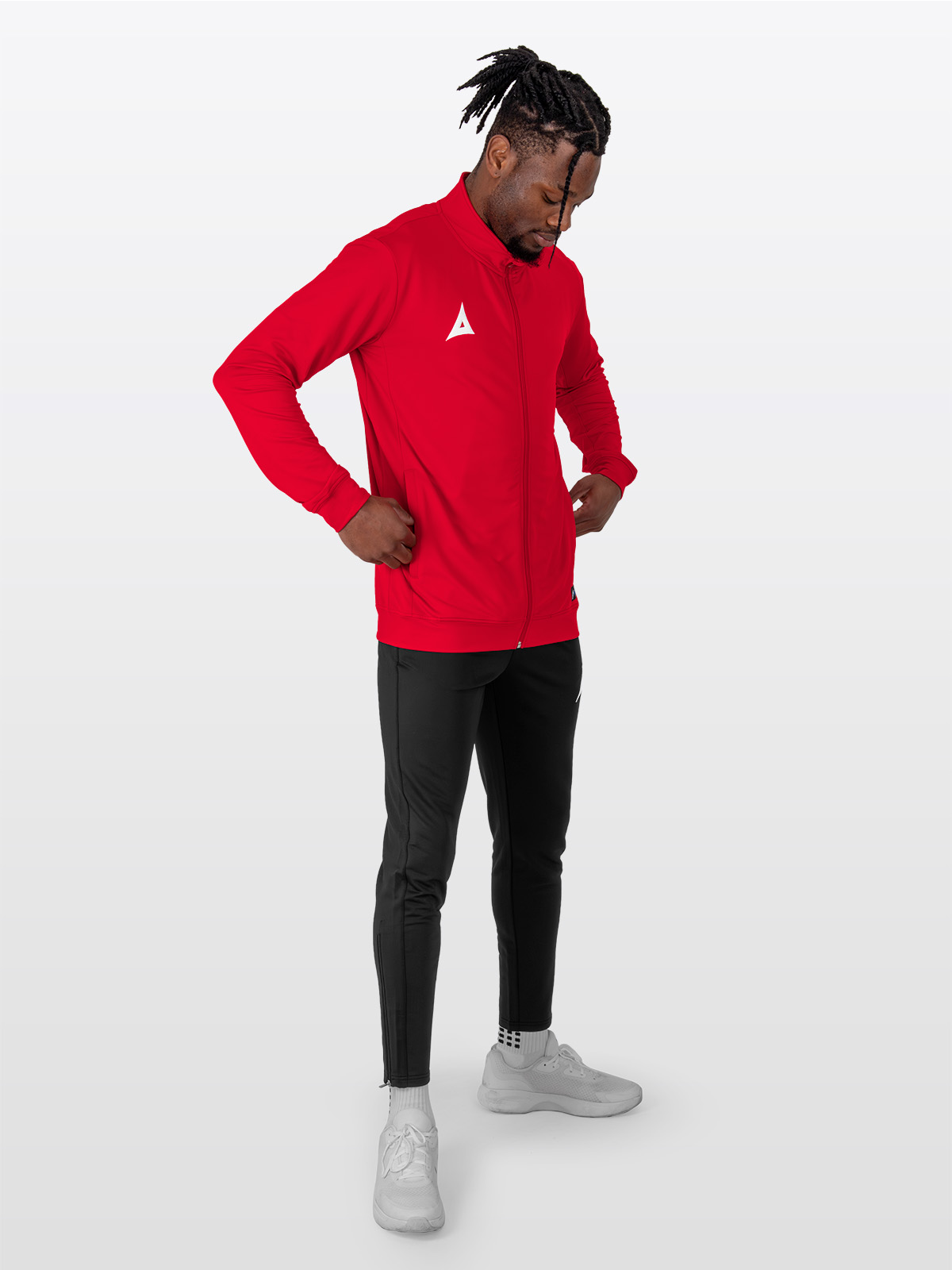 a male model wearing the avec focus 2 red track jacket, a full tracksuit with black focus 2 tech pant