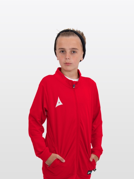 A boy is stood wearing the Avec Focus 2 Red Track Jacket, Plain Red tracksuit a full Zip