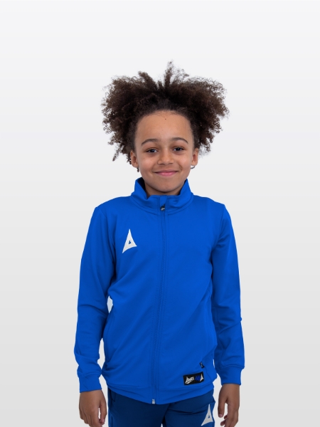 A boy is stood wearing the Avec Focus 2 Royal Track Jacket, Plain tracksuit full Zip