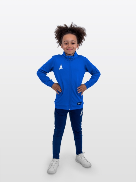 boy is stood wearing the Avec Focus 2 Royal Track Jacket, Plain Royal Blue full Zip and the Avec Focus 2 Navy Tech Pant