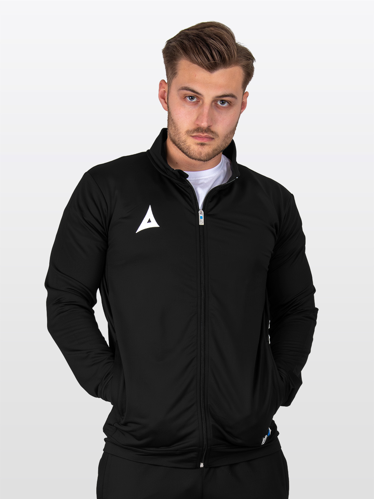 a male wearing the avec focus 2 black track jacket and evolve t-shirt in white