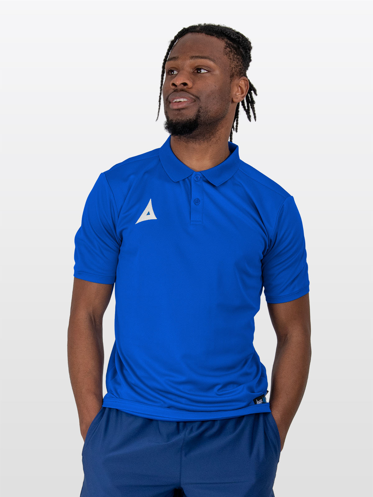 a male model wearing the avec focus 2 royal blue tech polo, plain blue button up top