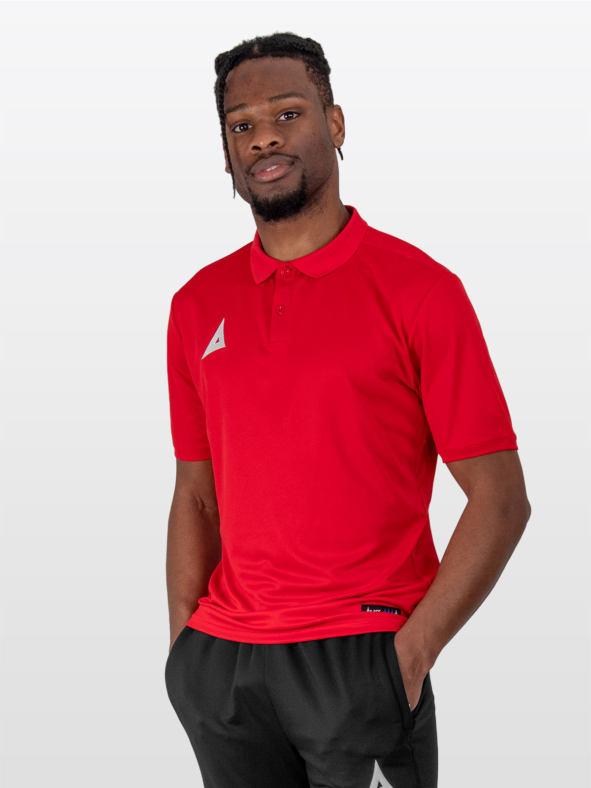 a male model wearing the avec focus 2 red tech polo, plain red top