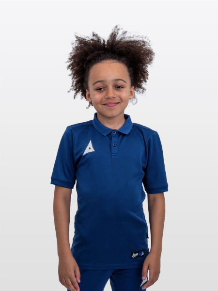 A boy is wearing the Avec Focus 2 Navy Tech Polo 