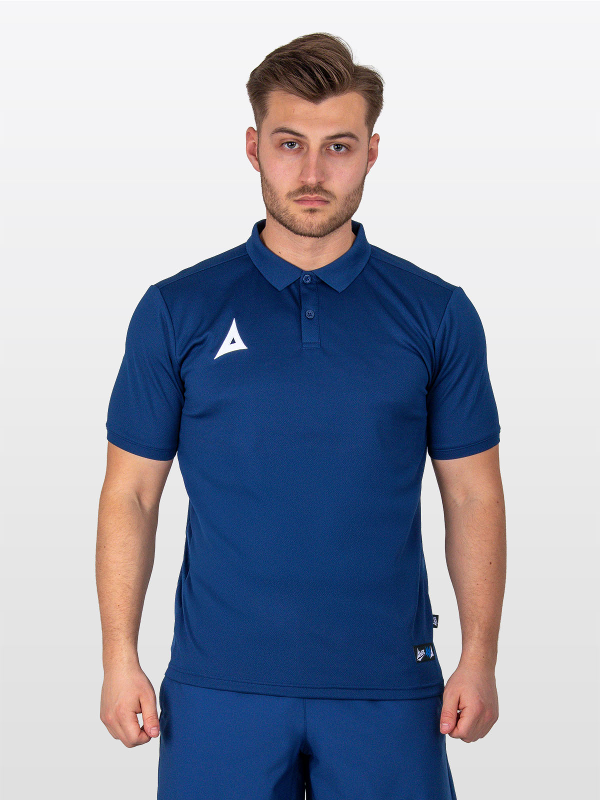 a male model wearing the avec focus 2 navy blue tech polo, plain navy button up tee