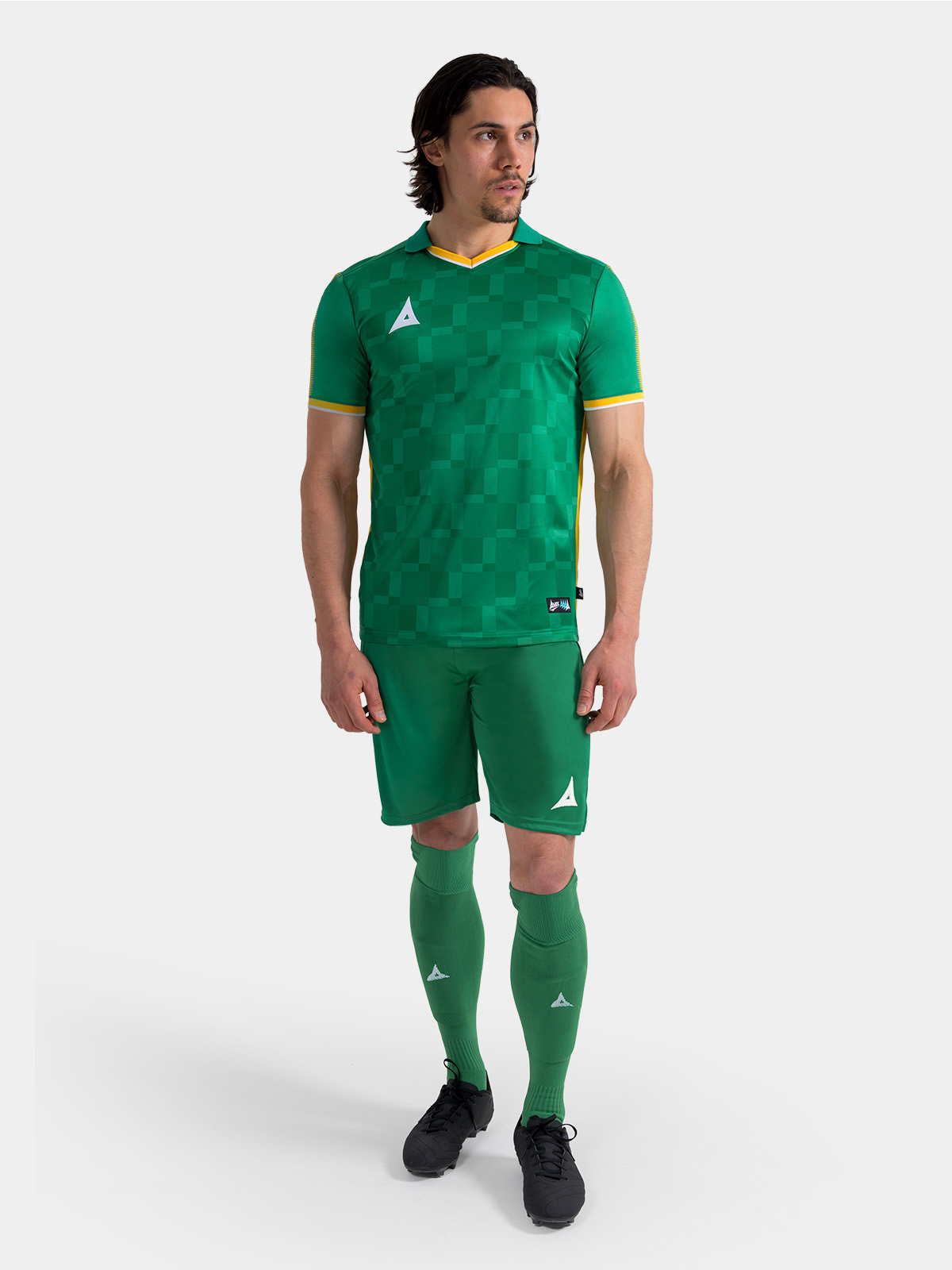 sq pro green shirt shown as part of full kit