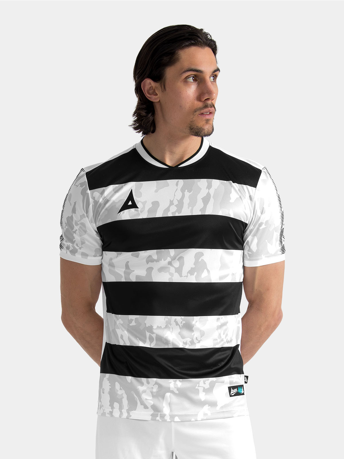 model wearing the black and white pro intent hoop jersey, showcasing the professional pro-fit and athletic silhouette.