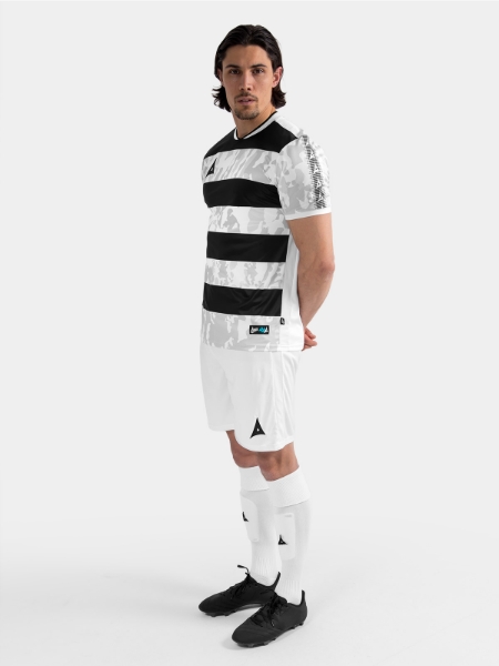 Full body kit view of the Black and White Pro Intent Jersey, styled with matching teamwear shorts and socks.