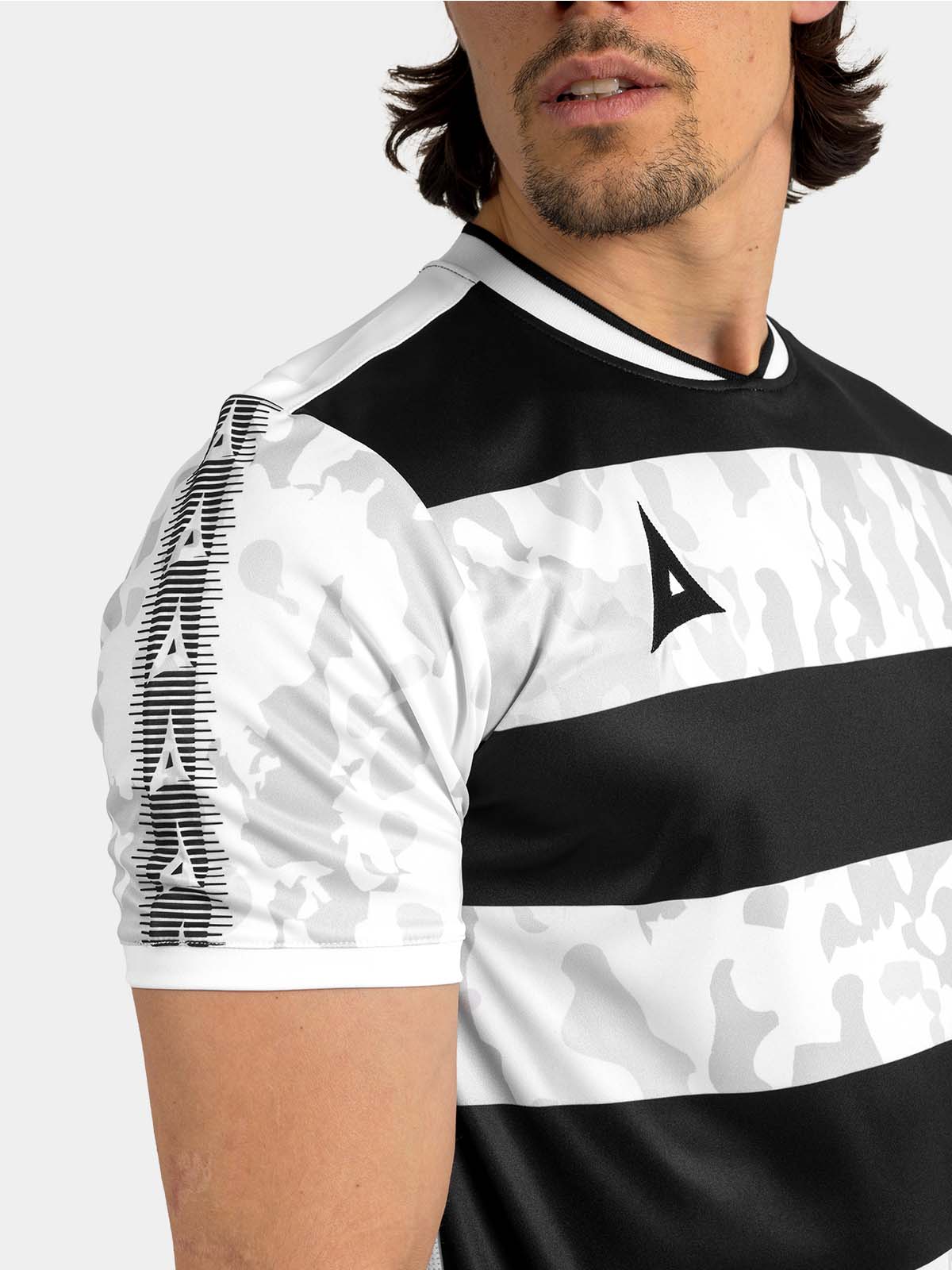 detailed close-up of the black and white jersey shoulder with the signature heritage 'a' contrast panel.