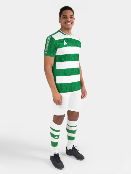 Full matchday look featuring the Green and White Pro Intent Hoop Jersey on-model for a complete club aesthetic.