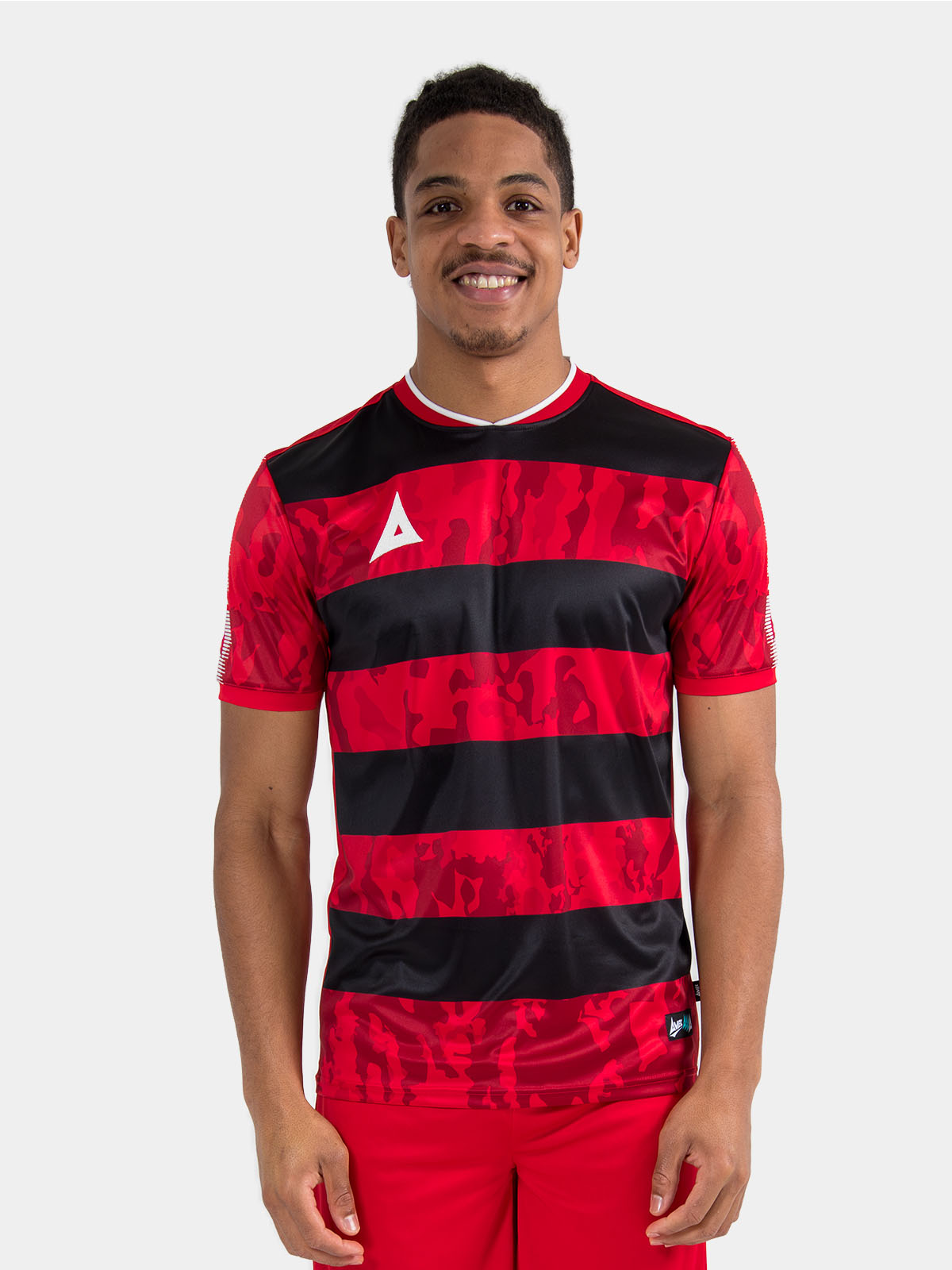 upper body view of a model wearing the red and black pro intent jersey, showcasing the true-to-size athletic cut.