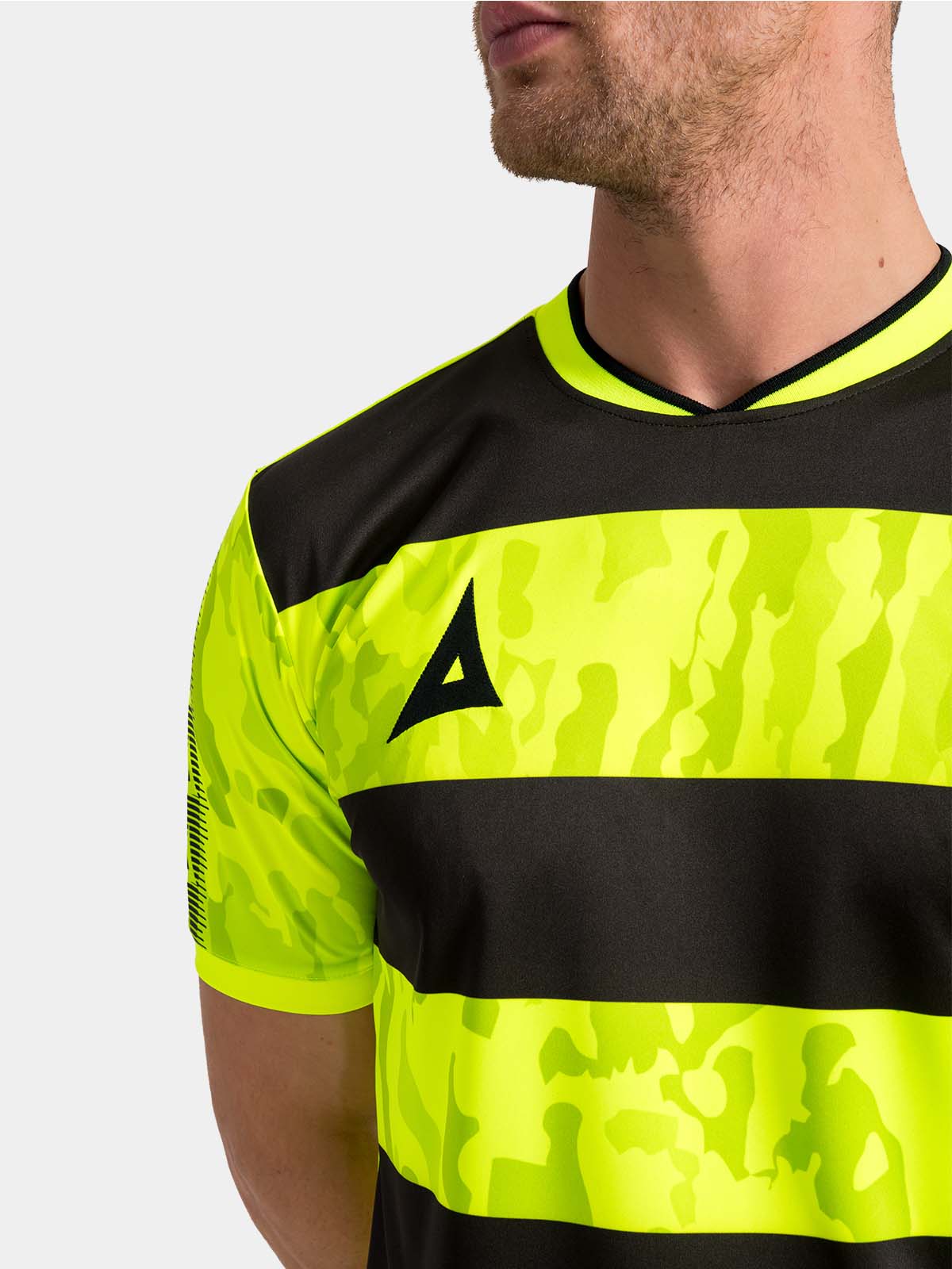 close-up of the neon yellow v-neck collar and comfortable internal neck branding.