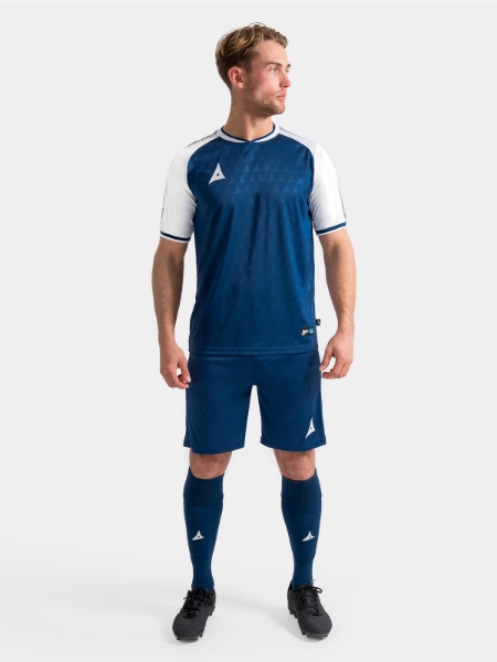 Model wearing the complete Navy and White Heritage matchday kit for a professional squad look.