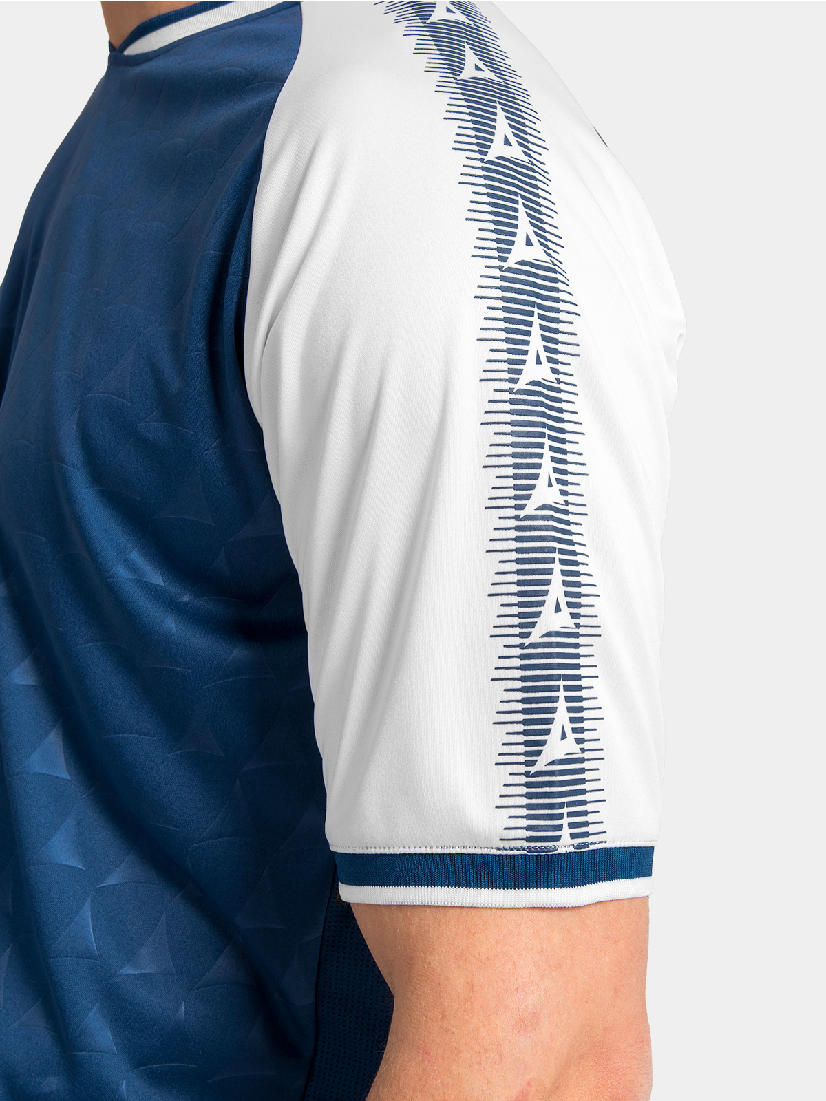 close-up of the navy heritage sleeve with repeating white brand patterns.