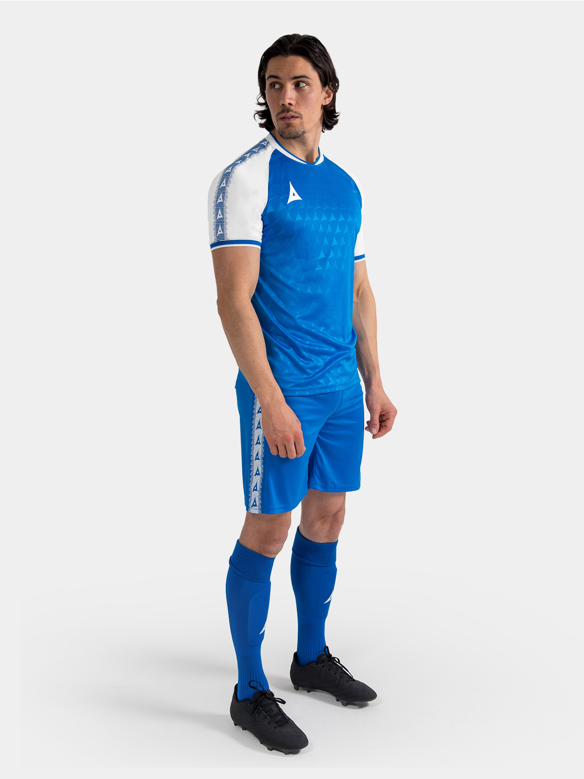 complete royal blue heritage match kit on-model, showcasing the full professional aesthetic.