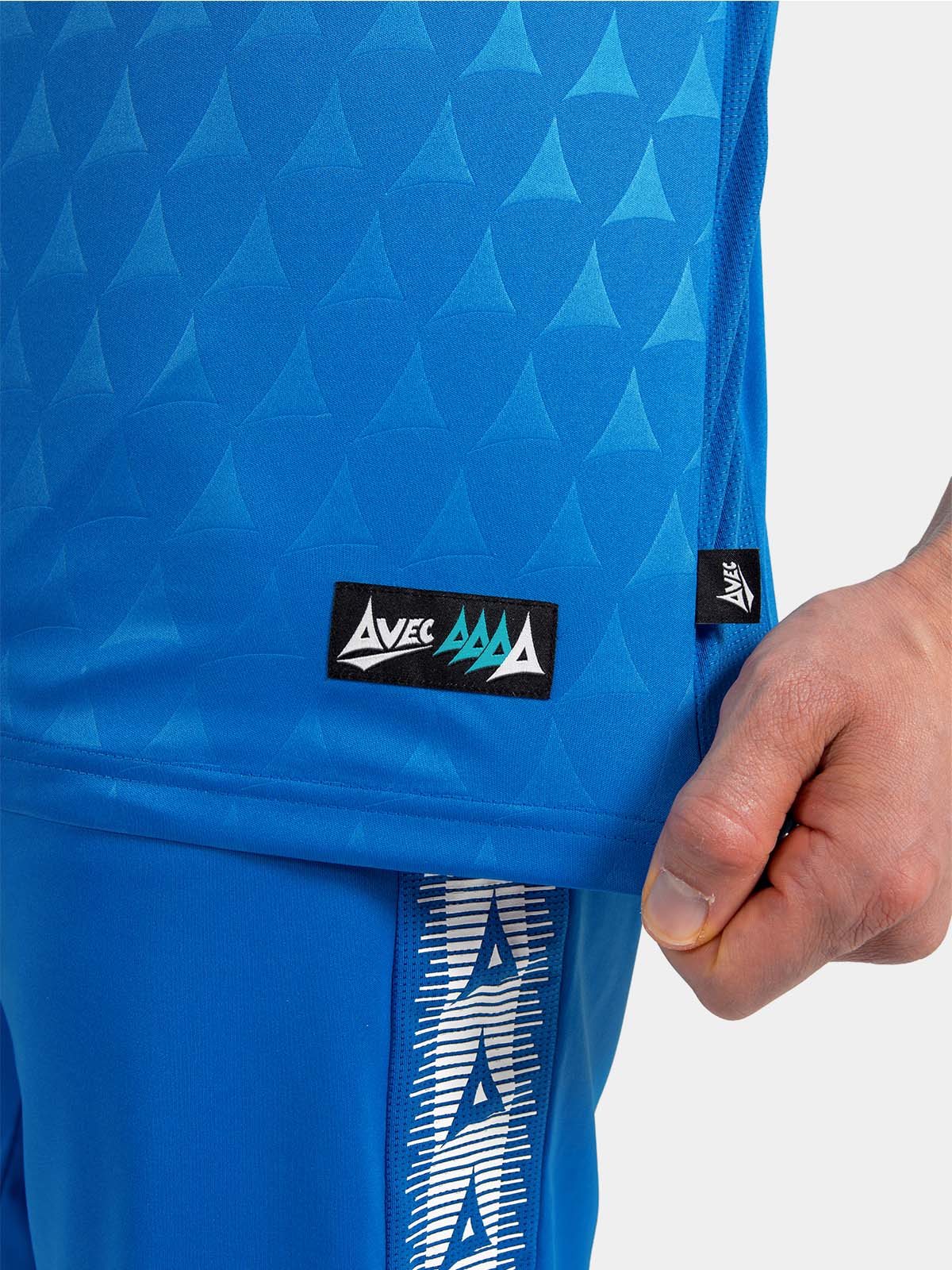 lower side view of the royal blue heritage jersey showing the high-performance mesh ventilation.