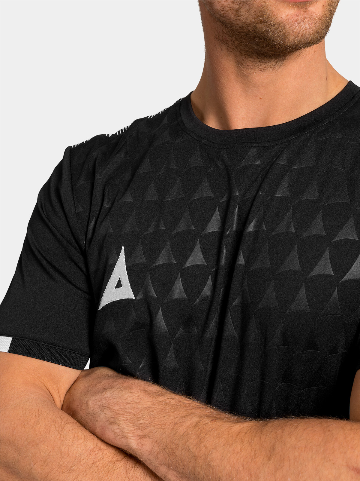 close-up shot of the front panel displaying the premium repeating debossed 'a' logo texture. 